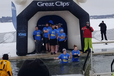 IC System employees jumping in a lake in the 2020 Polar Plunge