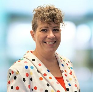 A smiling photo of Kristina Gursky